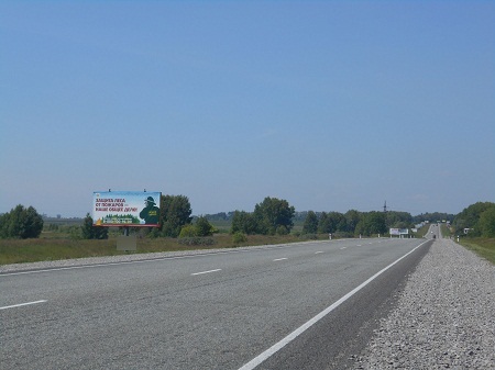 Фотография рекламного носителя, тип: Билборд 3x6, адрес: Омск - Черлак а/д., 17 869м, Омск, Омская область, Россия. Сторона B №382263