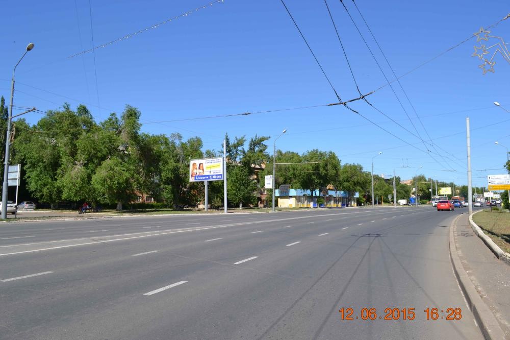 Фотография рекламного носителя, тип: Билборд 3x6, адрес: Гагарина пр-т., д.2 Х 60 лет Октября ул., Оренбург, Оренбургская область, Россия. Сторона B №648062