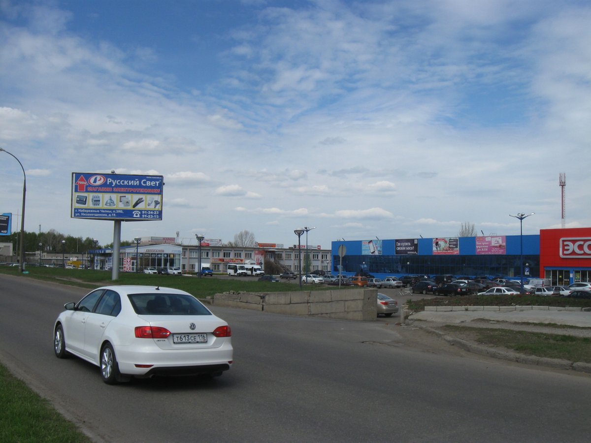 Фотография рекламного носителя, тип: Билборд 3x6, адрес: Низаметдинова ул., гипермаркета Эссен, Набережные Челны, Республика Татарстан, Россия. Сторона A №630841