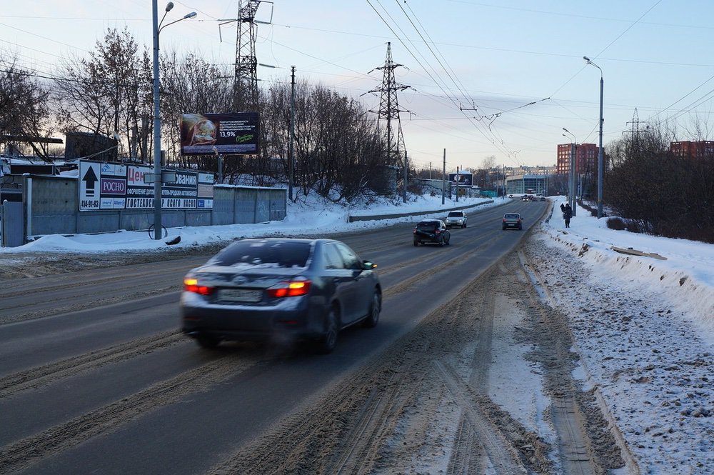 Фотография рекламного носителя, тип: Билборд 3x6, адрес: Бринского ул. Х Надежды Сусловой ул., д.23а, Нижний Новгород, Нижегородская область, Россия. Сторона B №680482