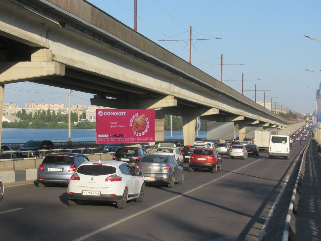 Фотография рекламного носителя, тип: Билборд 3x6, адрес: Северный мост, опора 8, Воронеж, Воронежская область, Россия. Сторона А1 №1051632