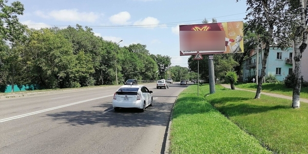 Фотография рекламного носителя, тип: Билборд 3x6, адрес: Владивостокское ш., д.129, Уссурийск, Приморский край, Россия. Сторона А №756881
