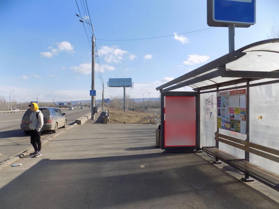 Фотография рекламного носителя, тип: Остановка 1.8x1.2, адрес: Октябрьский мост, Остров Татышев, поз.2, Красноярск, Красноярский край, Россия. Сторона А №1029790