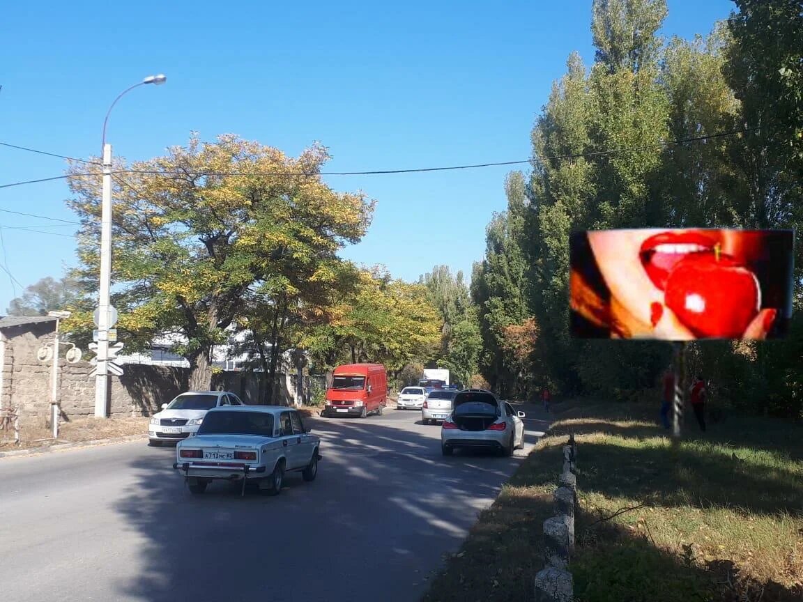 Фотография рекламного носителя, тип: Билборд 3x6, адрес: Москалева ул., переезд, Симферополь, Республика Крым, Россия. Сторона А №799513