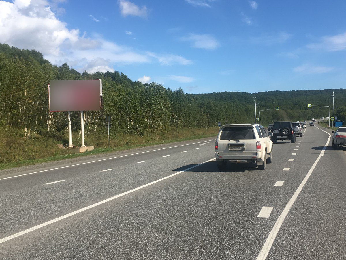 Фотография рекламного носителя, тип: Билборд 3x6, адрес: Федерральная трасса, 15 000м, кафе Юличка, Петропавловск-Камчатский, Камчатский край, Россия. Сторона Б №777483