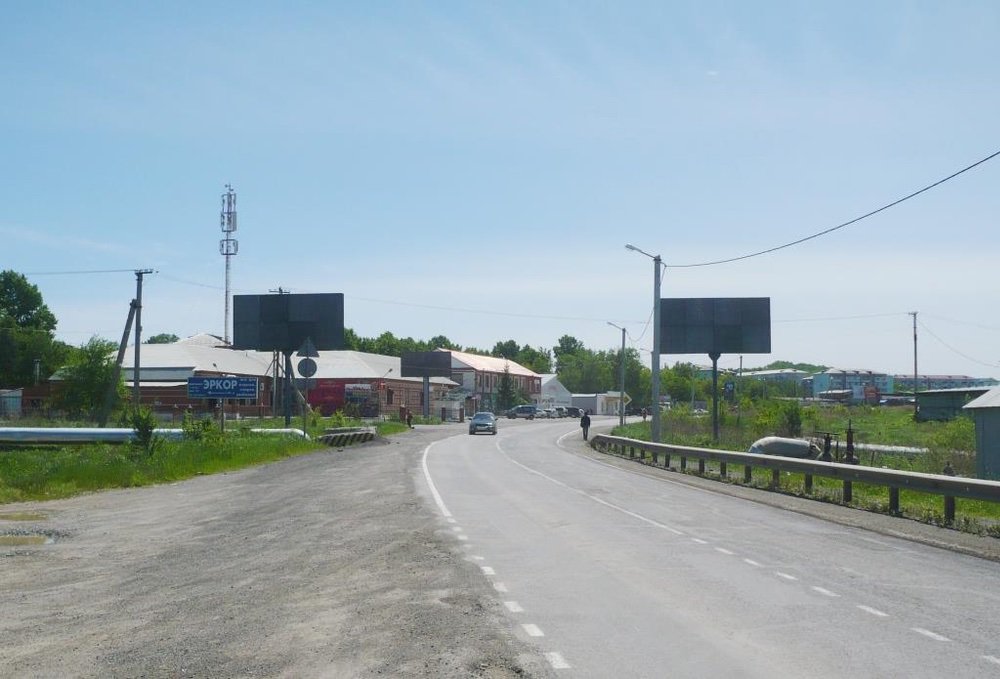 Фотография рекламного носителя, тип: Билборд 3x6, адрес: Лучегорск пос., 269 940м, поз.1, Владивосток, Приморский край, Россия. Сторона А №756782