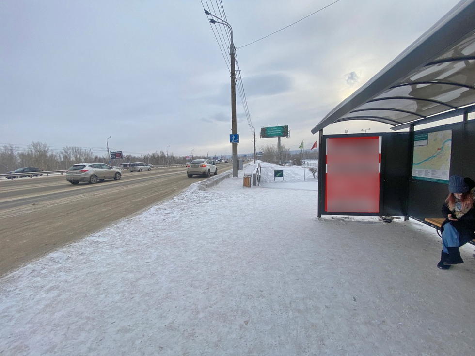 Фотография рекламного носителя, тип: Остановка 1.8x1.2, адрес: Октябрьский мост, Остров Татышев, поз.1, Красноярск, Красноярский край, Россия. Сторона А №1029788