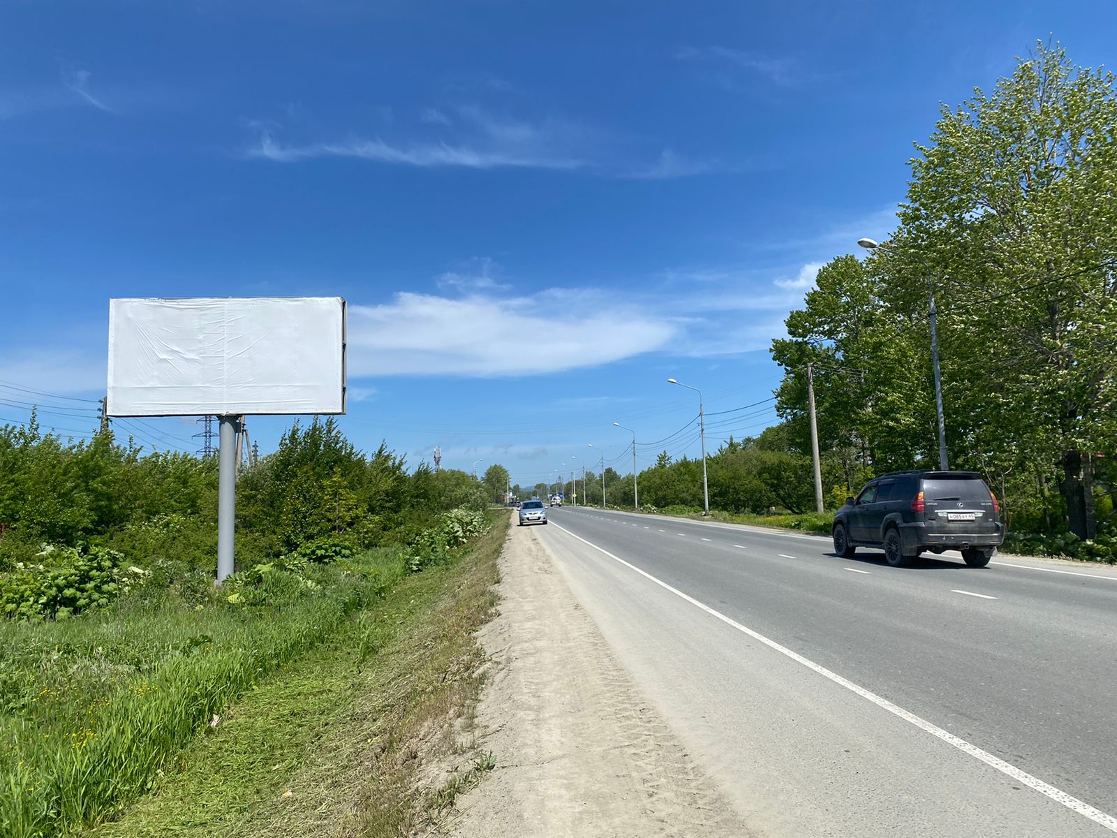 Фотография рекламного носителя, тип: Нестандартный билборд, адрес: Холмская ул., д.2/2, поз.1, Южно-Сахалинск, Сахалинская область, Россия. Сторона Б №766382