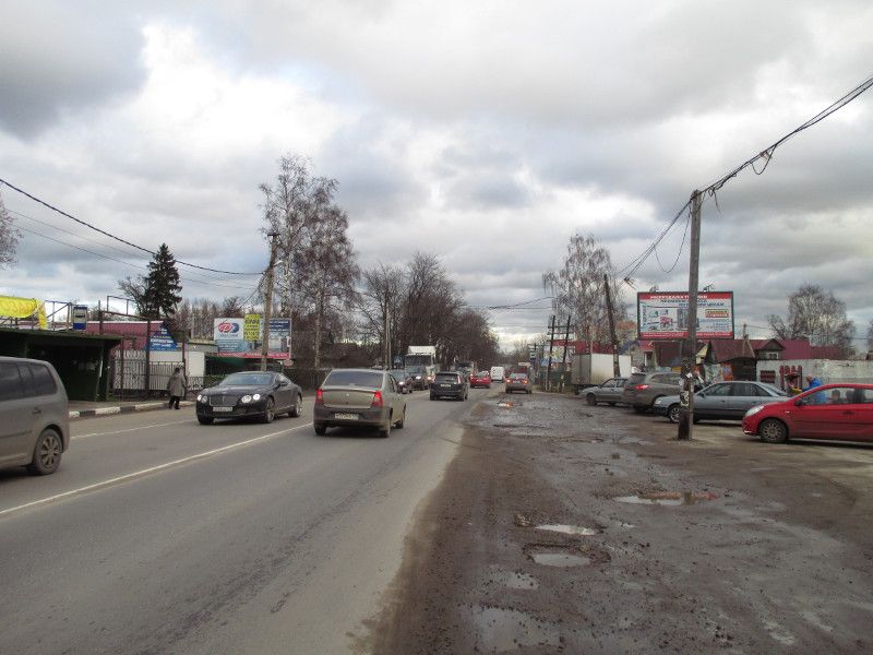 Фотография рекламного носителя, тип: Панель-кронштейн, адрес: Мурино г., Центральная ул., д.32, Ленинградская область, Россия. Сторона A №812375