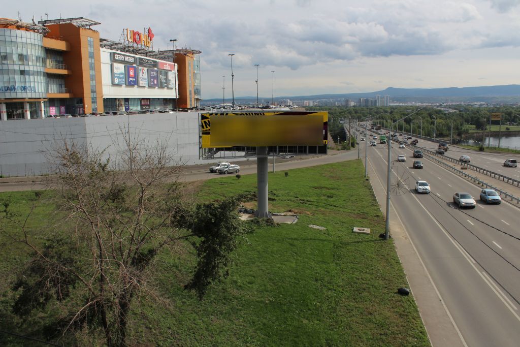 Фотография рекламного носителя, тип: Суперсайт 3x12, адрес: Октябрьский мост, поз.1, Красноярск, Красноярский край, Россия. Сторона Б №981351