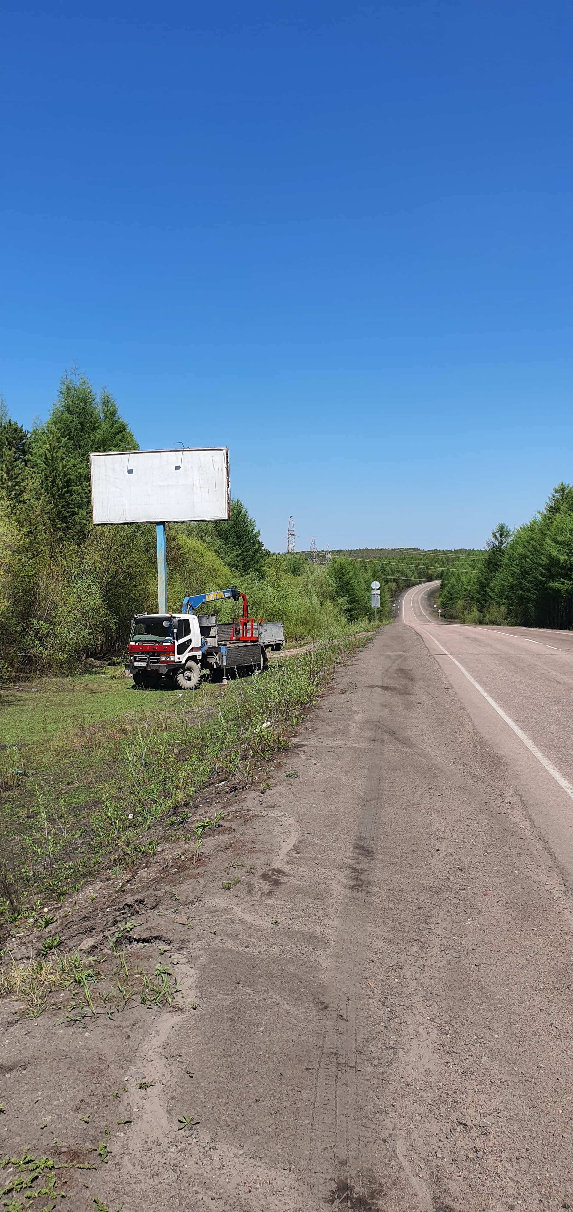 Фотография рекламного носителя, тип: Билборд 3x6, адрес: А-360 а/д., район кольца пос. Сер.бор, Нерюнгри, Республика Саха (Якутия), Россия. Сторона B №633949
