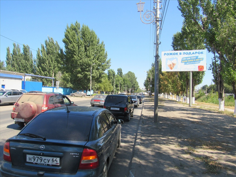 Фотография рекламного носителя, тип: Билборд 3x6, адрес: Ново-Астраханское ш. Х 5-й Динамовский пр-зд., Саратов, Саратовская область, Россия. Сторона А №819323