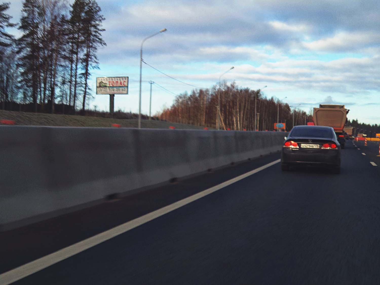 Фотография рекламного носителя, тип: Билборд 3x6, адрес: Трасса СКАНДИНАВИЯ, 57 500м, Ленинградская область, Россия. Сторона Б №771629