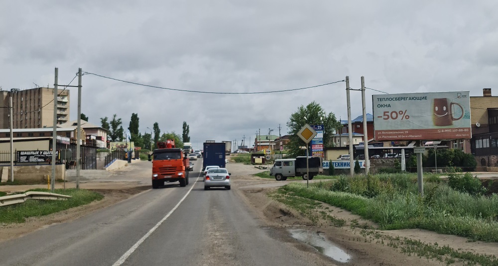 Фотография рекламного носителя, тип: Билборд 3x6, адрес: Чалтырь с., Социалистическая ул., Ростов-на-Дону, Ростовская область, Россия. Сторона A №514378