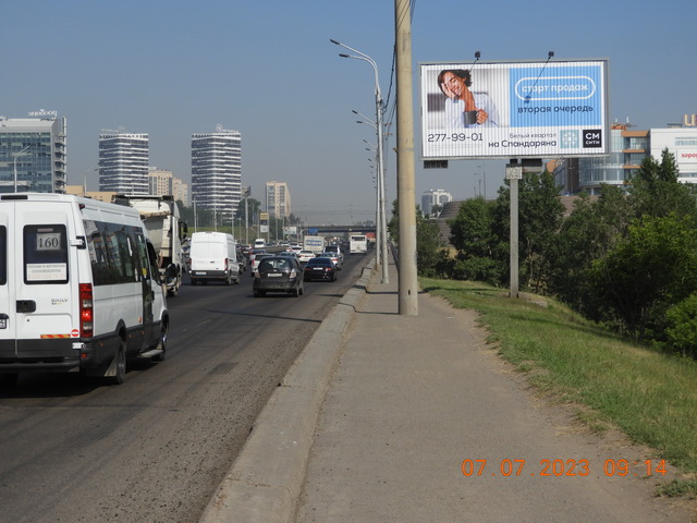 Фотография рекламного носителя, тип: Билборд 3x6, адрес: Октябрьский мост, Татышева о., 50м до мостового сооружения, Красноярск, Красноярский край, Россия. Сторона А1-A3 №526432
