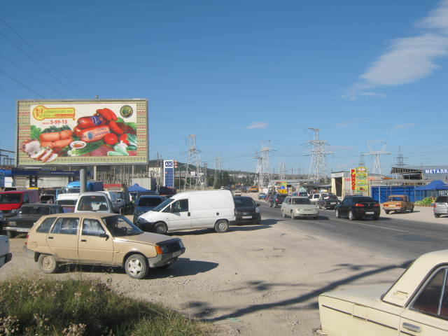 Фотография рекламного носителя, тип: Билборд 3x6, адрес: Керченское ш. Х Чкалова ул., Феодосия, Республика Крым, Россия. Сторона B №411549
