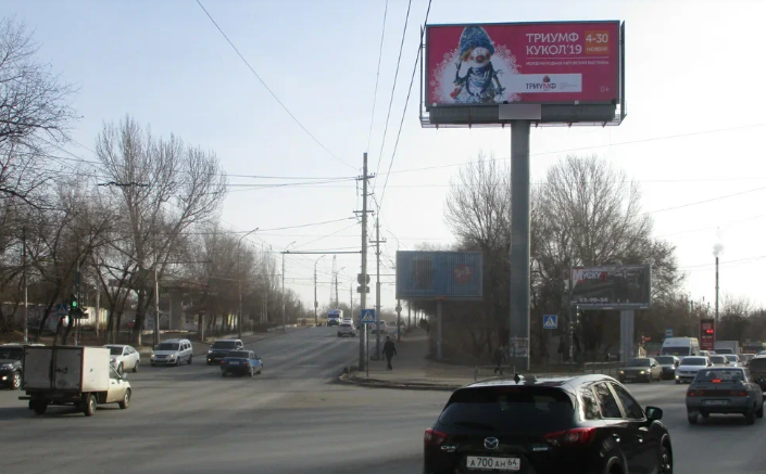 Фотография рекламного носителя, тип: Суперсайт 5x12, адрес: ул. Тракторная - пр. им. 50 лет Октября, Саратов, Саратовская область, Россия. Сторона А №1078152