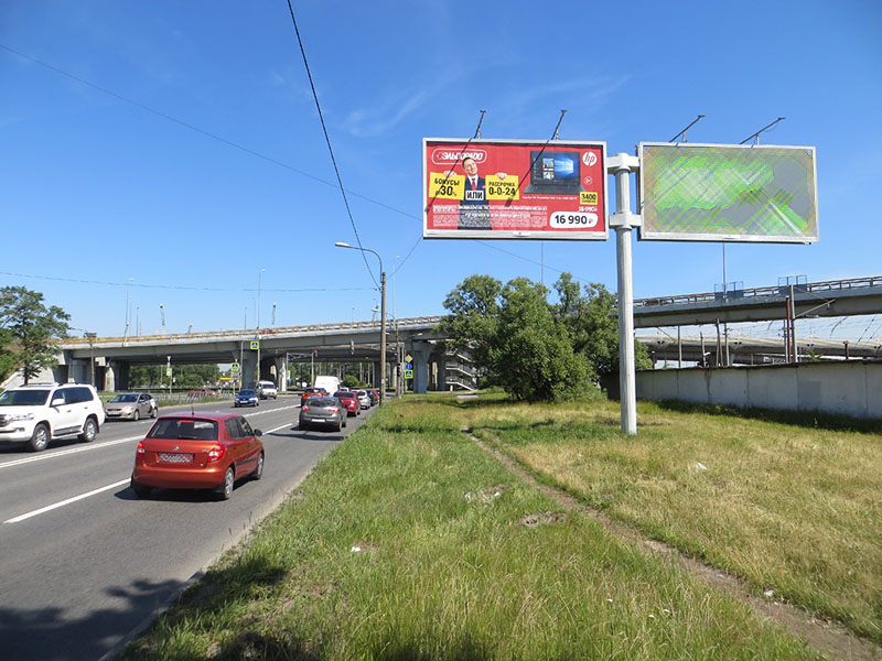 Фотография рекламного носителя, тип: Билборд 3x6, адрес: Народного Ополчения пр-т., д.131 X Дачный пр-т., Санкт-Петербург, Россия. Сторона А1 №641971