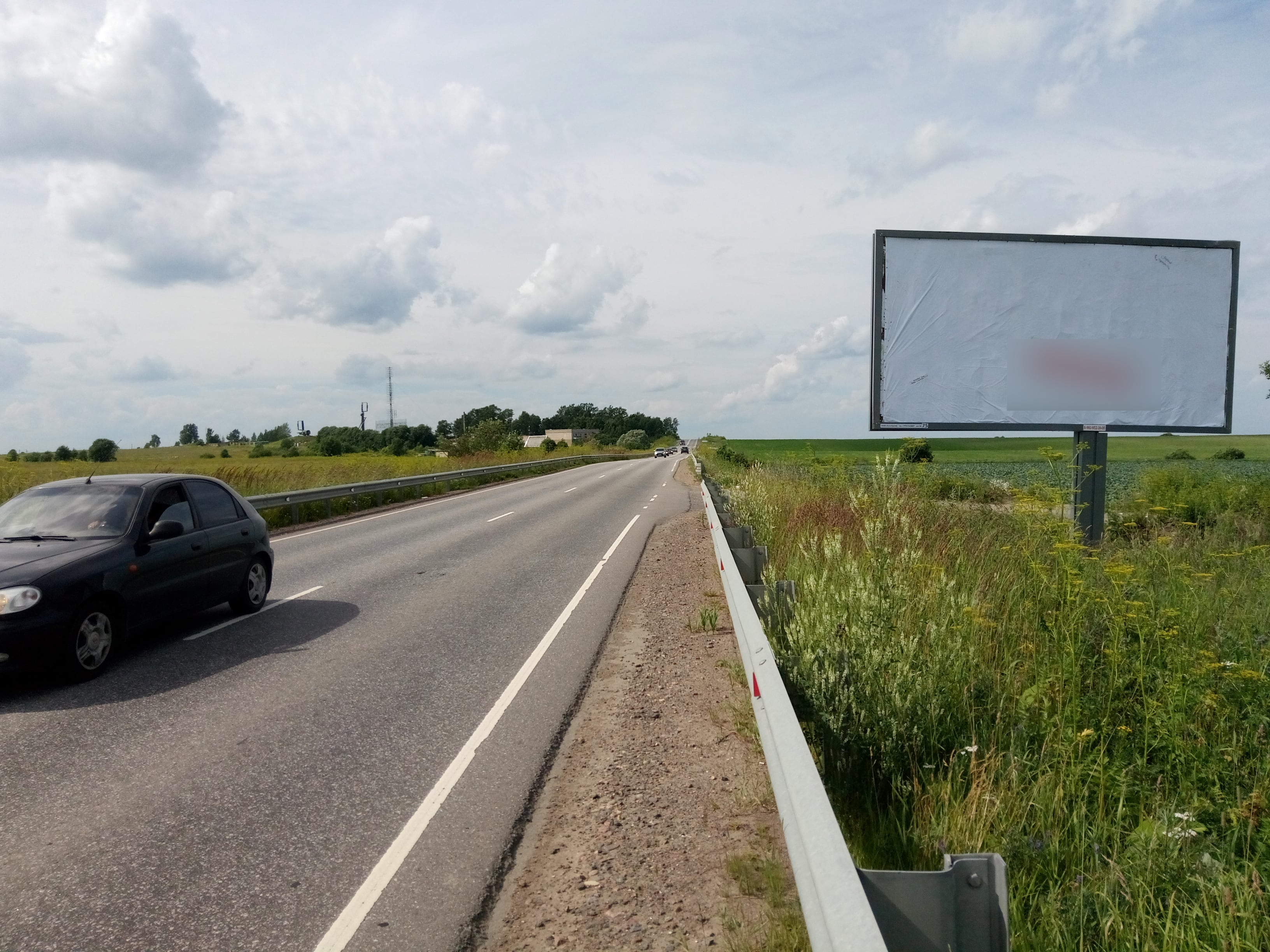 Фотография рекламного носителя, тип: Билборд 3x6, адрес: Аннино - Капорье - Таллинское ш. а/д., 16 100м, Санкт-Петербург, Россия. Сторона А №666029