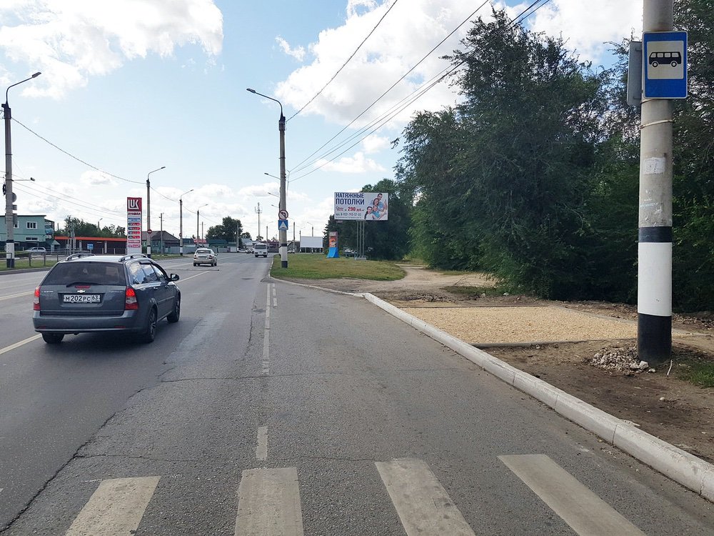 Фотография рекламного носителя, тип: Билборд 3x6, адрес: Сызрань г., Монастырская ул., д.3, Самара, Самарская область, Россия. Сторона A №629845