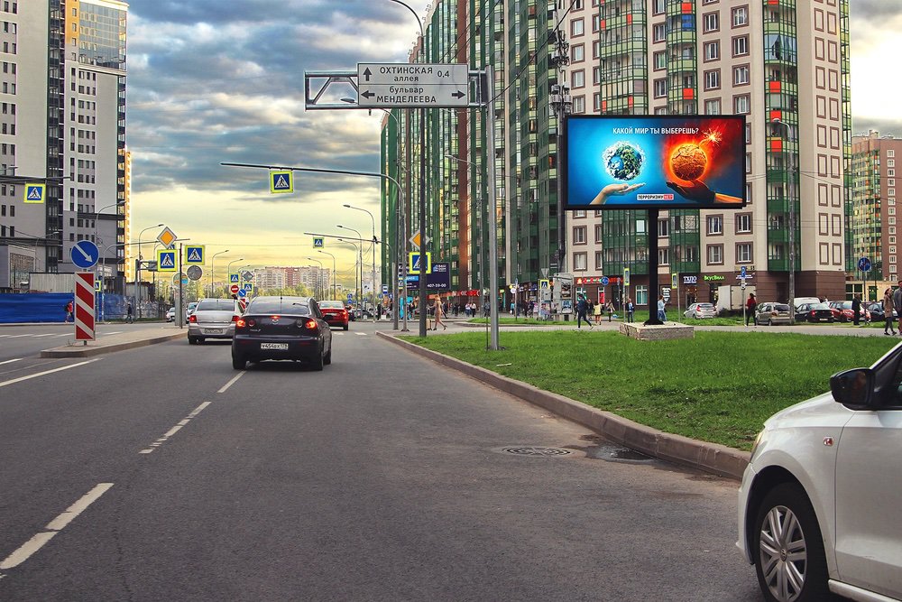 Фотография рекламного носителя, тип: Билборд 3x6, адрес: Мурино г., Шувалова ул., д.7 Х Менделеева б-р., Санкт-Петербург, Россия. Сторона A №776264