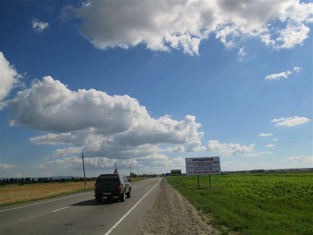 Фотография рекламного носителя, тип: Билборд 3x6, адрес: Крымск-Славянск-на-Кубани а/д, 31 685м, Крымск, Краснодарский край, Россия. Сторона А №1020864