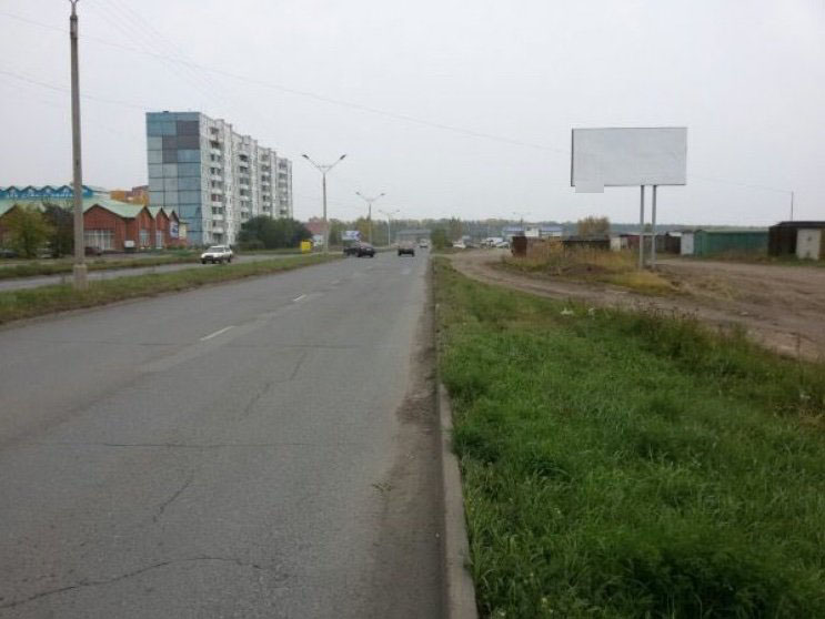 Фотография рекламного носителя, тип: Билборд 3x6, адрес: Шарыпово г., Центральный пр-т., д.7, Красноярск, Красноярский край, Россия. Сторона А №745289