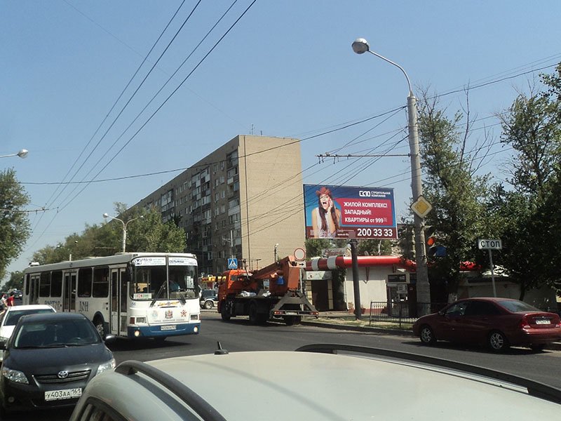 Фотография рекламного носителя, тип: Билборд 3x6, адрес: Коммунистический пр-т., д.49, Ростов-на-Дону, Ростовская область, Россия. Сторона A №688789