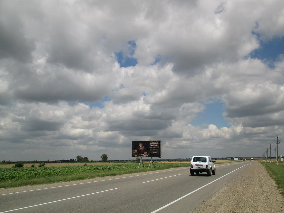 Фотография рекламного носителя, тип: Билборд 3x6, адрес: Крымск-Славянск-на-Кубани а/д, 125 450м, Крымск, Краснодарский край, Россия. Сторона Б №1020860