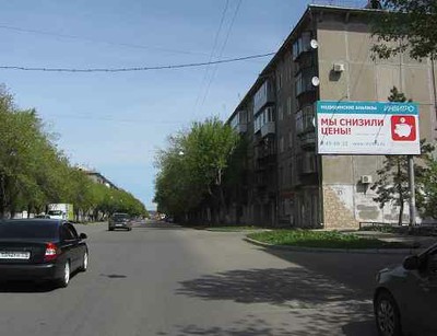 Фотография рекламного носителя, тип: Билборд 3x6, адрес: Октябрьская ул., д.23, Магнитогорск, Челябинская область, Россия. Сторона А №780614