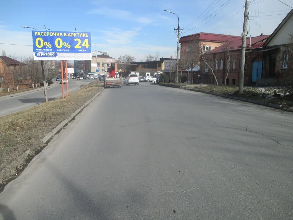 Фотография рекламного носителя, тип: Билборд 3x6, адрес: Ватутина ул., д.59 Х Джанаева ул., Владикавказ, Республика Северная Осетия – Алания, Россия. Сторона Б №462845