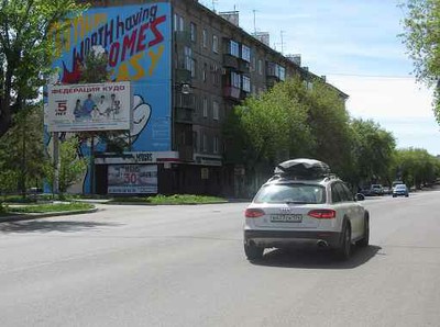 Фотография рекламного носителя, тип: Билборд 3x6, адрес: Октябрьская ул., д.23, Магнитогорск, Челябинская область, Россия. Сторона Б №780615