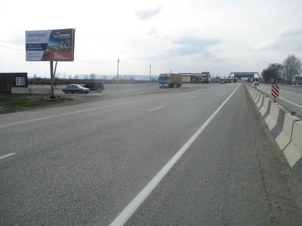 Фотография рекламного носителя, тип: Билборд 3x6, адрес: Кавказ а/д, пост ГИБДД, Владикавказ, Республика Северная Осетия – Алания, Россия. Сторона Б №769175
