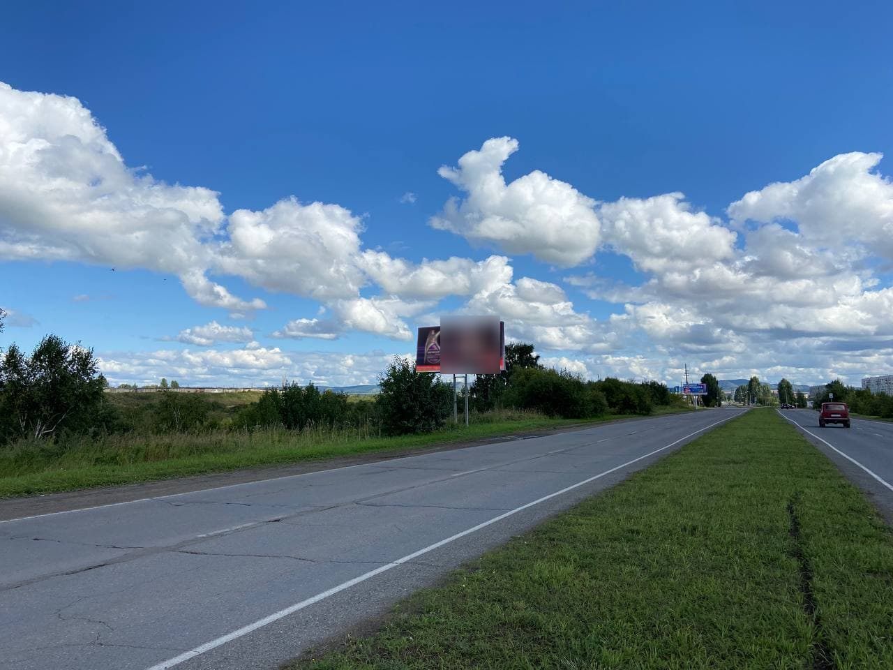 Фотография рекламного носителя, тип: Билборд 3x6, адрес: Шарыпово пос., Российская ул., напротив АЗС Фортуна плюс, Красноярск, Красноярский край, Россия. Сторона Б №588669