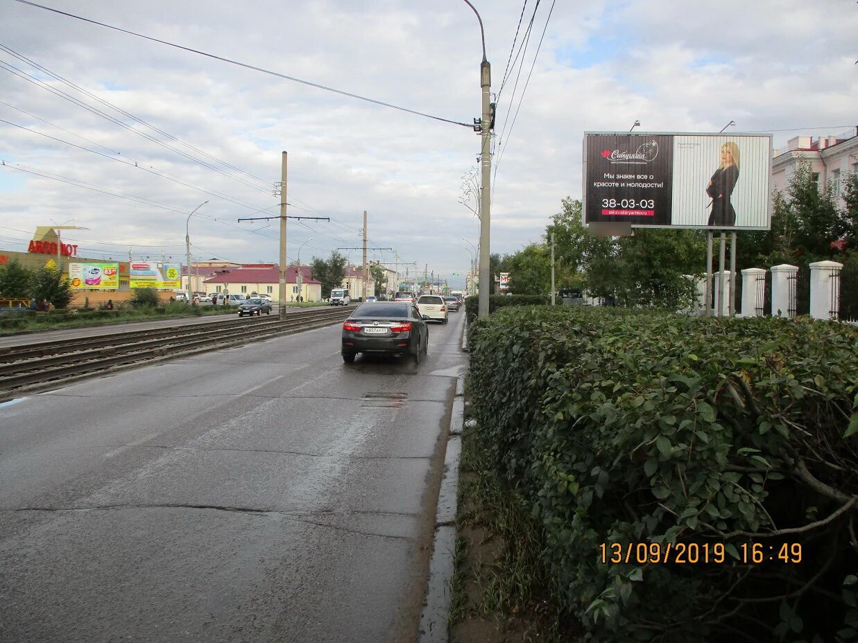 Фотография рекламного носителя, тип: Билборд 3x6, адрес: Терешковой ул., д.13, Улан-Удэ, Республика Бурятия, Россия. Сторона А1-А3 №697184