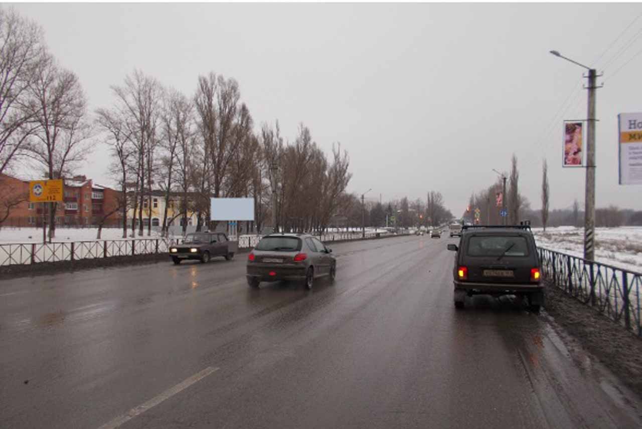 Фотография рекламного носителя, тип: Билборд 3x6, адрес: Харьковская ул., д.58 в, на 891 200 м, Новошахтинск, Ростовская область, Россия. Сторона Б №1093611