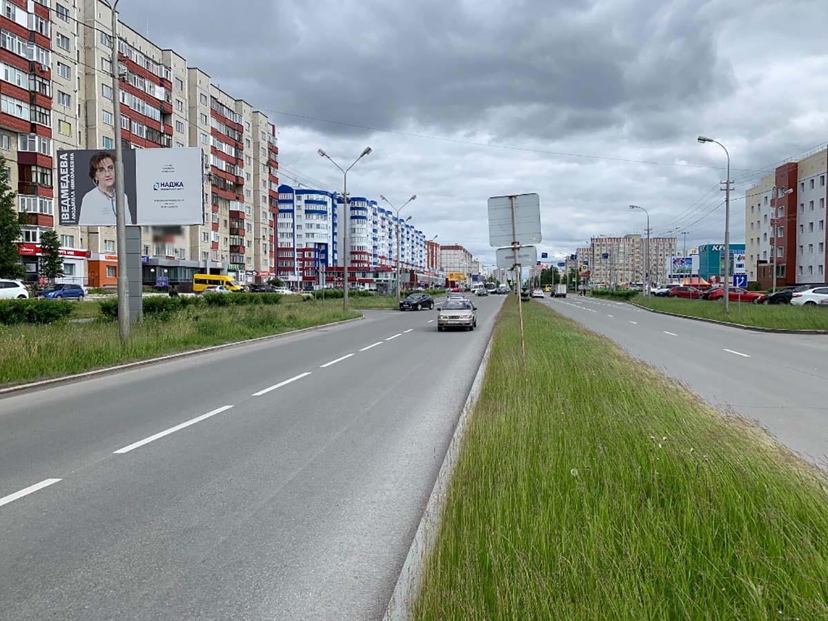 Фотография рекламного носителя, тип: Билборд 3x6, адрес: Комсомольский пр-т., д.15, Сургут, Ханты-Мансийский автономный округ – Югра, Россия. Сторона Б №959971