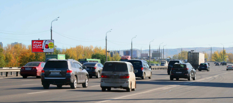 Фотография рекламного носителя, тип: Билборд 3x6, адрес: Октябрьский мост, 100 м до ост. Остров Татышев, Красноярск, Красноярский край, Россия. Сторона Б1-Б3 №819891