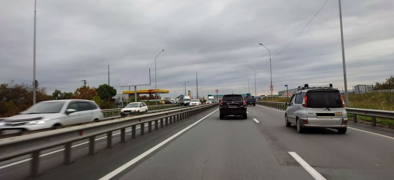 Фотография рекламного носителя, тип: Билборд 3x6, адрес: подъезд к аэропорту г. Вл-ка а/д , 2 900м, слева, Владивосток, Приморский край, Россия. Сторона Б №960424