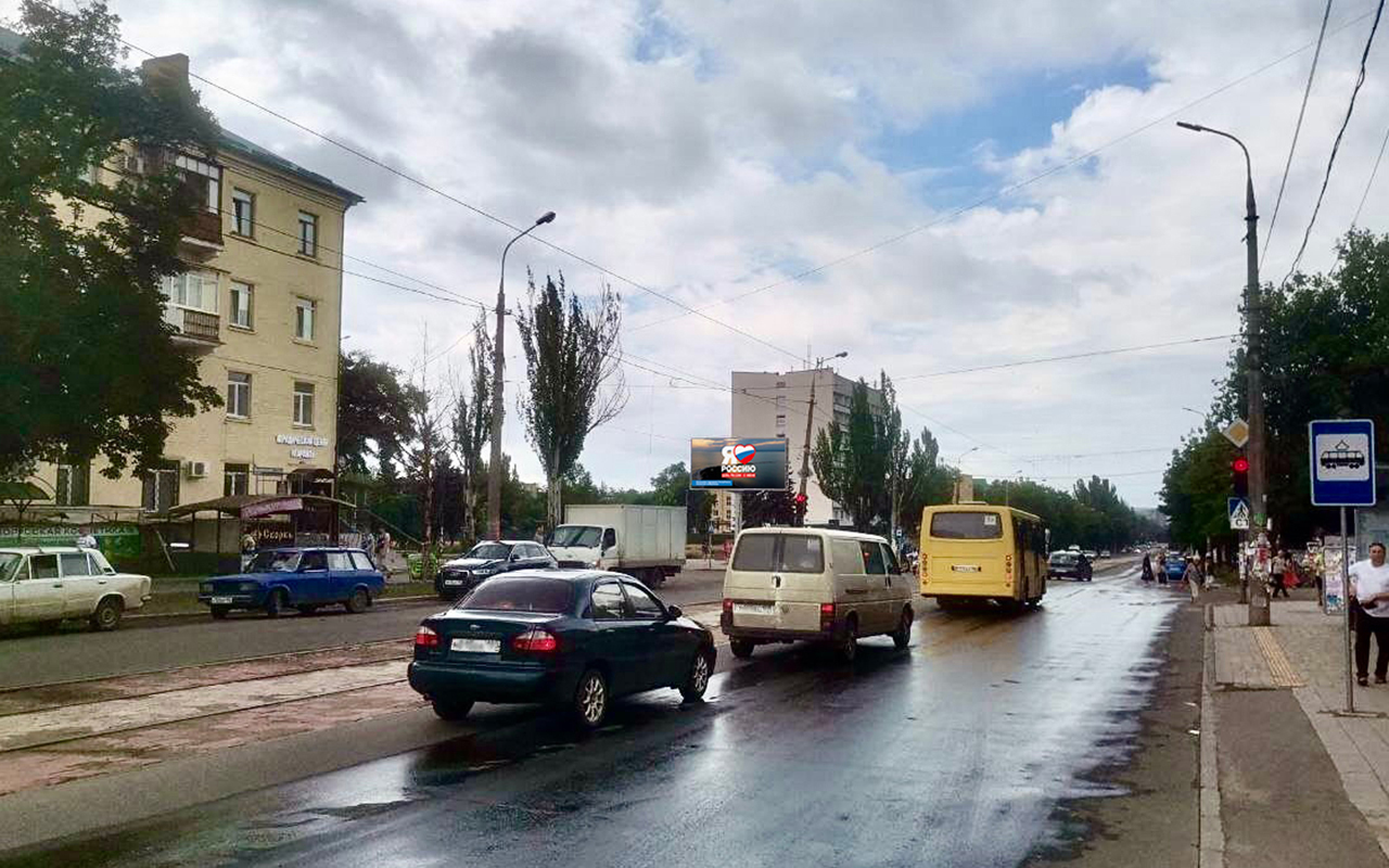 Фотография рекламного носителя, тип: Билборд 3x6, адрес: Металлургов пр-т. Х Блажевича ул., поз.1, Мариуполь, Донецкая область, Россия. Сторона Б1-Б10 №1097592
