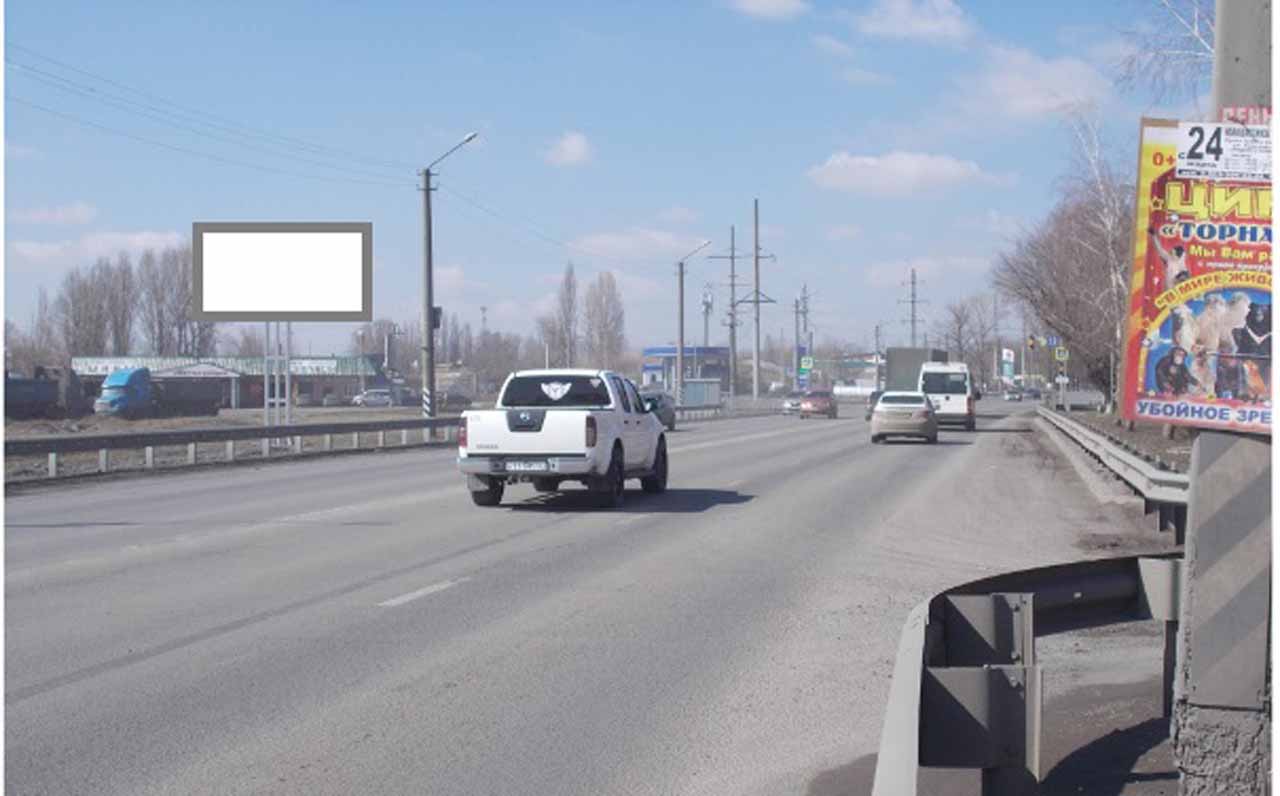 Фотография рекламного носителя, тип: Билборд 3x6, адрес: Харьковская ул., д.90, на 890 км 675 м, Новошахтинск, Ростовская область, Россия. Сторона Б №1093613