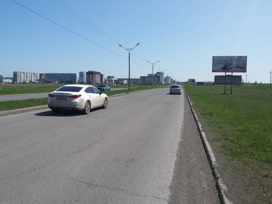 Фотография рекламного носителя, тип: Билборд 3x6, адрес: Шарыпово г., Центральный пр-т., 100м от АЗС, Красноярск, Красноярский край, Россия. Сторона A №960918