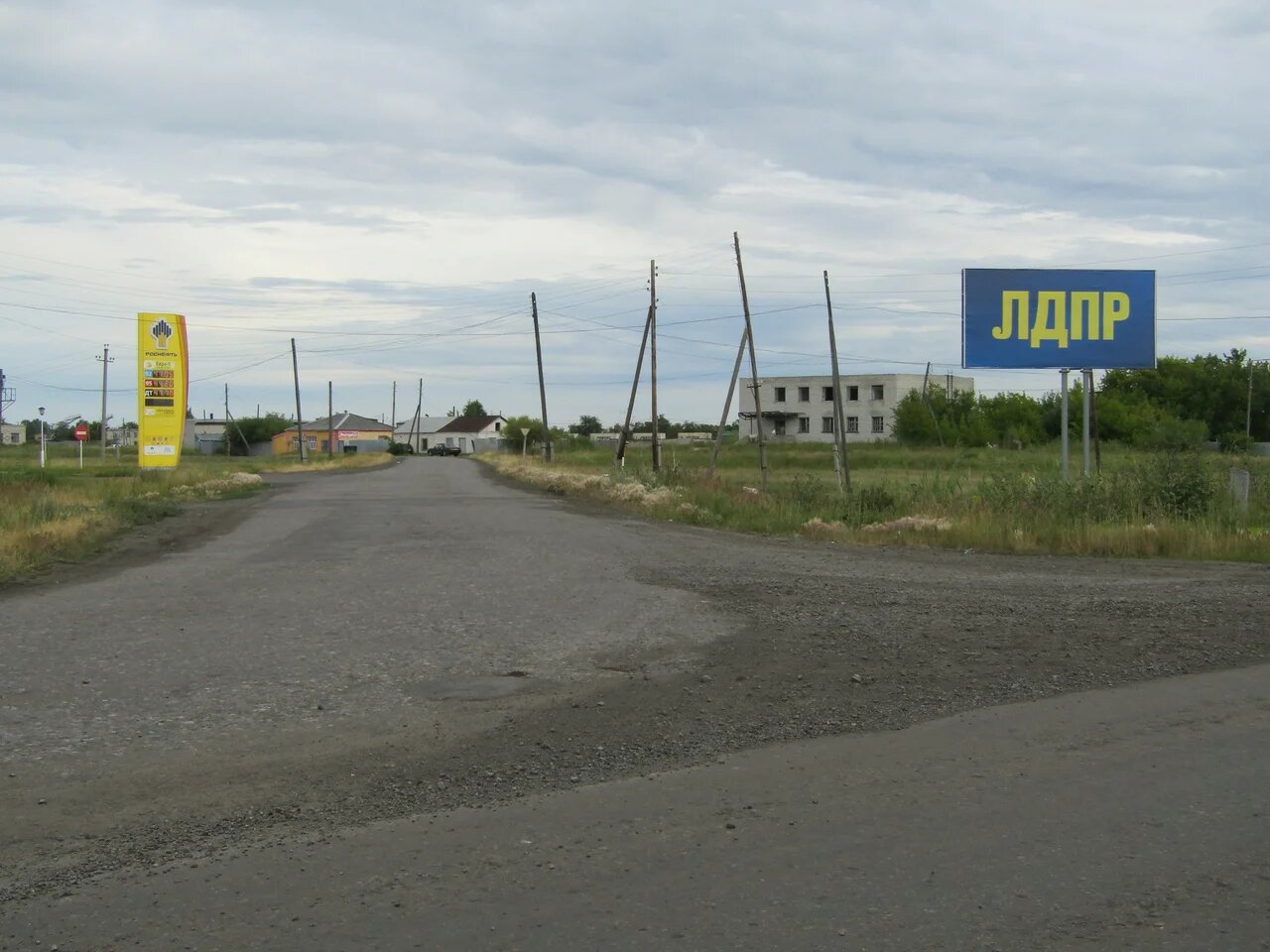 Фотография рекламного носителя, тип: Билборд 3x6, адрес: Лебяжье пос., Спортивная ул., д.2а, Курган, Курганская область, Россия. Сторона А №871511