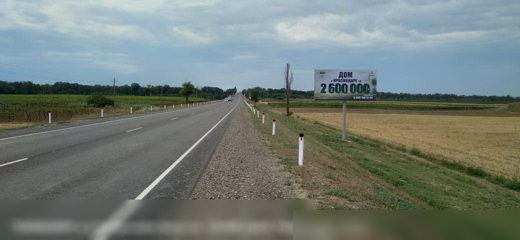 Фотография рекламного носителя, тип: Билборд 3x6, адрес: Новороссийск-Керчь а/д, 110 600м, Темрюк, Краснодарский край, Россия. Сторона A №840659