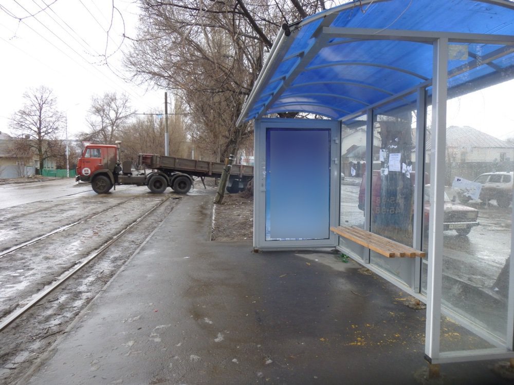 Фотография рекламного носителя, тип: Остановка 1.8x1.2, адрес: Клочкова ул., д.36, Саратов, Саратовская область, Россия. Сторона А №747476