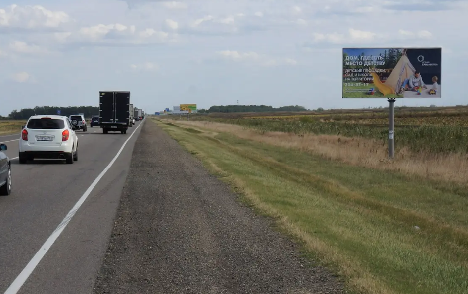 Фотография рекламного носителя, тип: Билборд 3x6, адрес: Краснодар - Славянск-на-Кубани - Крым а/д., 21 495м, Краснодар, Краснодарский край, Россия. Сторона А №1028171