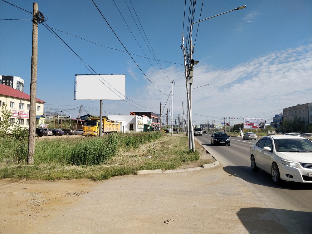 Фотография рекламного носителя, тип: Билборд 3x6, адрес: Автодорожная ул., д.4/2, Якутск, Республика Саха (Якутия), Россия. Сторона Б №1053940