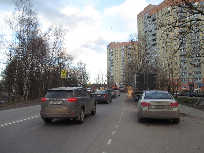Фотография рекламного носителя, тип: Панель-кронштейн, адрес: Мурино г., Оборонная, д.2, к. 1, лит.А, напротив, Ленинградская область, Россия. Сторона A №812385