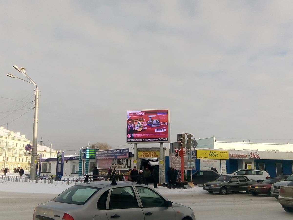 Фотография рекламного носителя, тип: Медиафасад, адрес: Шевцовой ул., д.15, Ленинск-Кузнецкий, Кемеровская область, Россия. Сторона A1-A10 №813125