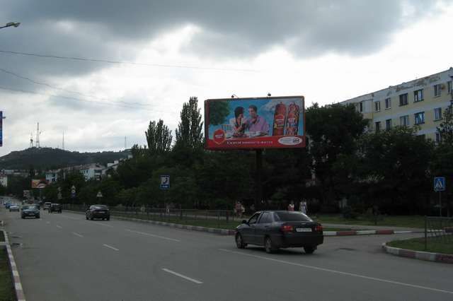 Фотография рекламного носителя, тип: Билборд 3x6, адрес: Крымская ул., д.13, Феодосия, Республика Крым, Россия. Сторона A №537649